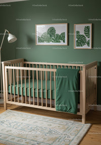 Modern Nursery with Green Wall and Tropical Leaf Art