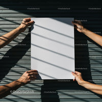 Two People Holding Blank White Paper Outdoors