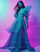 Elegant Woman in Flowing Blue Dress with Vibrant Lighting