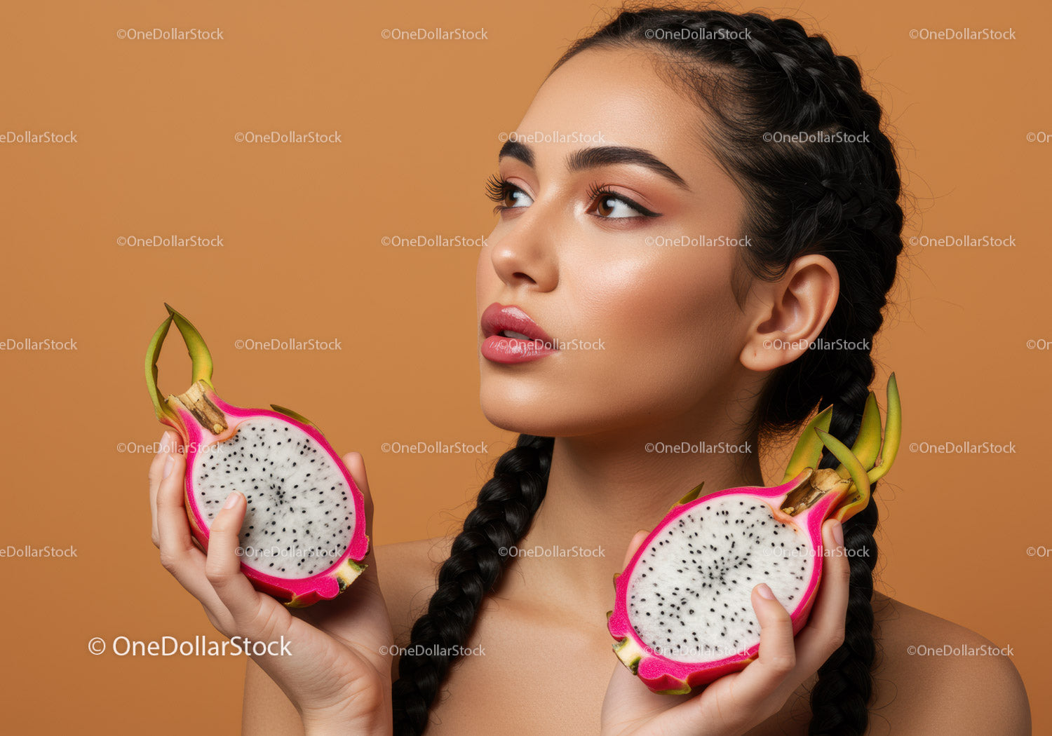 Portrait of a Woman with Dragon Fruit Halves on Orange Background