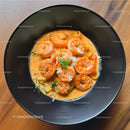 Seafood Pasta with Shrimp in Creamy Sauce in Black Bowl