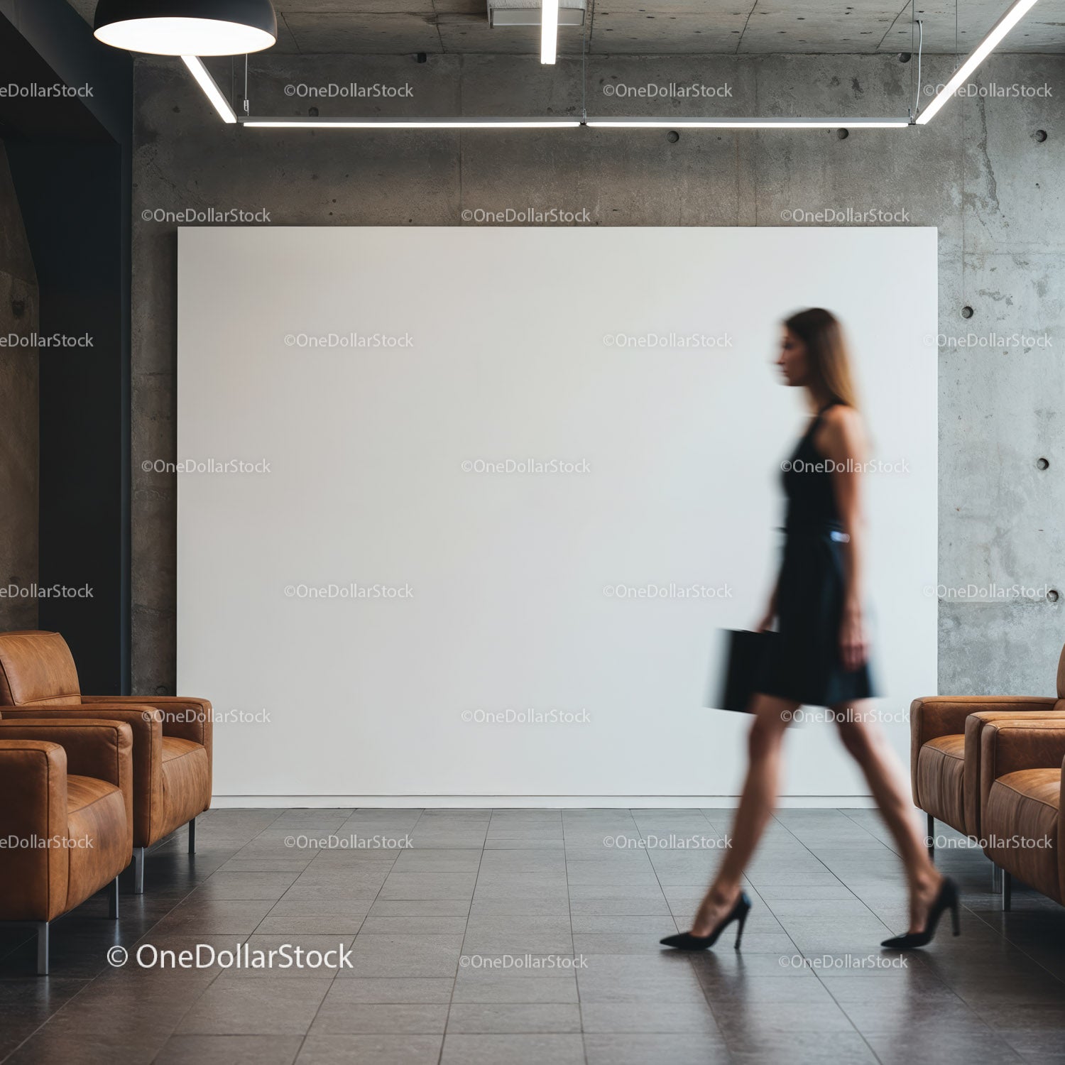 Blurred businesswoman walking through modern office lobby