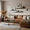 Cozy modern living room with brown leather sofa and decor