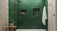 Modern bathroom with green tiles and gold fixtures
