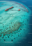 Overwater Bungalows in Turquoise Blue Ocean with Scenic Tropical View