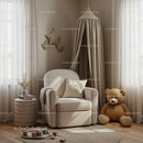 Cozy beige nursery corner with armchair and teddy bear