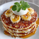 Stack of Golden Brown Pancakes with Banana Slices and Caramel Drizzle