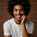 Portrait of a Smiling Young Man with Curly Hair and Natural Expression