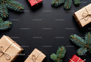 Wrapped Gifts and Pine Branches on Dark Background