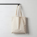 Minimalist Canvas Tote Bag Hanging on Wall Hook