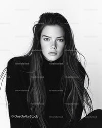 Black and White Portrait of a Young Woman with Long Hair and Intense Gaze