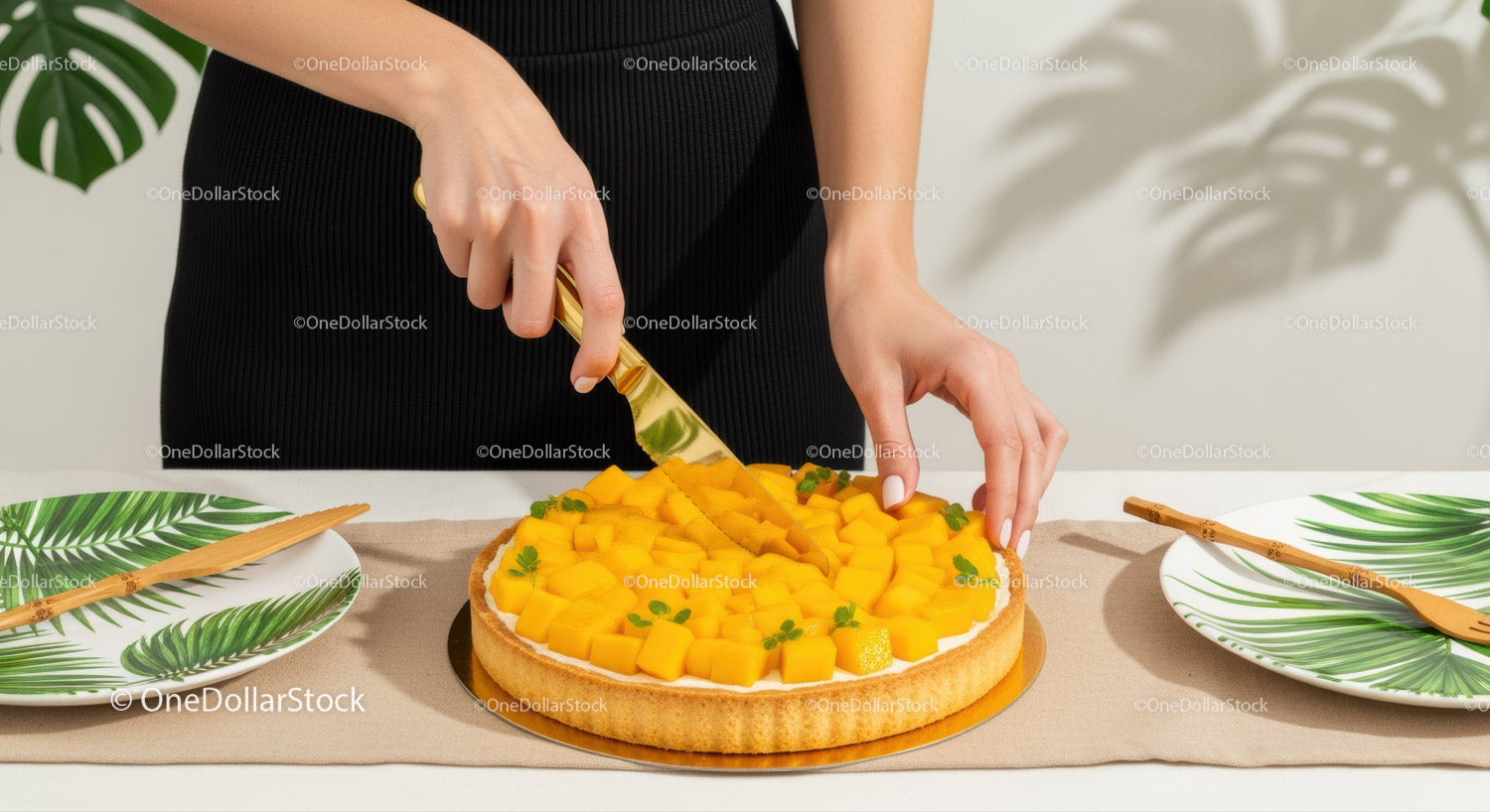 Woman Slicing Mango Tart with Fresh Fruit and Tropical Decor