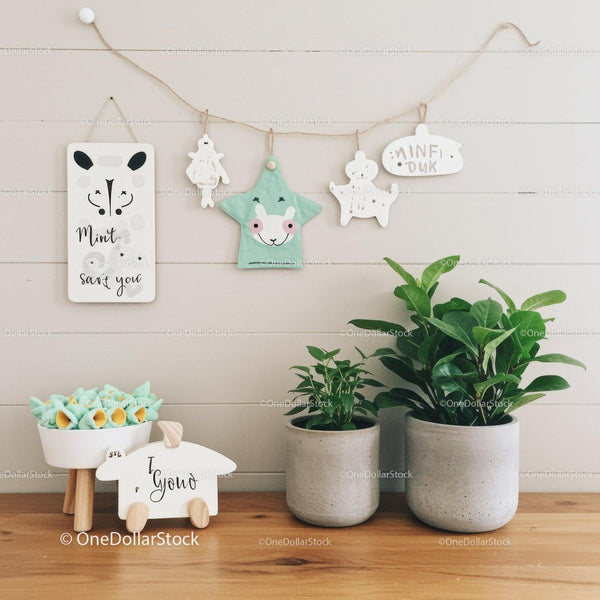 Cute Children's Room Wall Decor with Plush Star and Green Plants