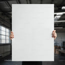 Person Holding Blank Poster in Industrial Workspace JPG Mockup Image preview