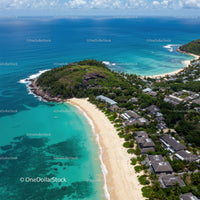 Tropical Island Beach with Rocky Hill and Villas in Bright Summer Light