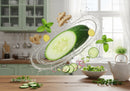 Fresh cucumber and ginger splash with herbs in kitchen