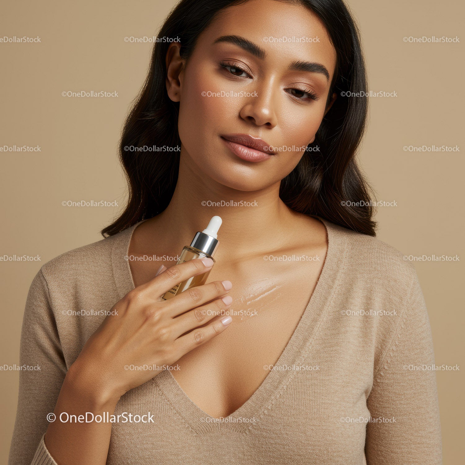 Elegant Woman with Flawless Skin Applying Serum in Beauty Routine