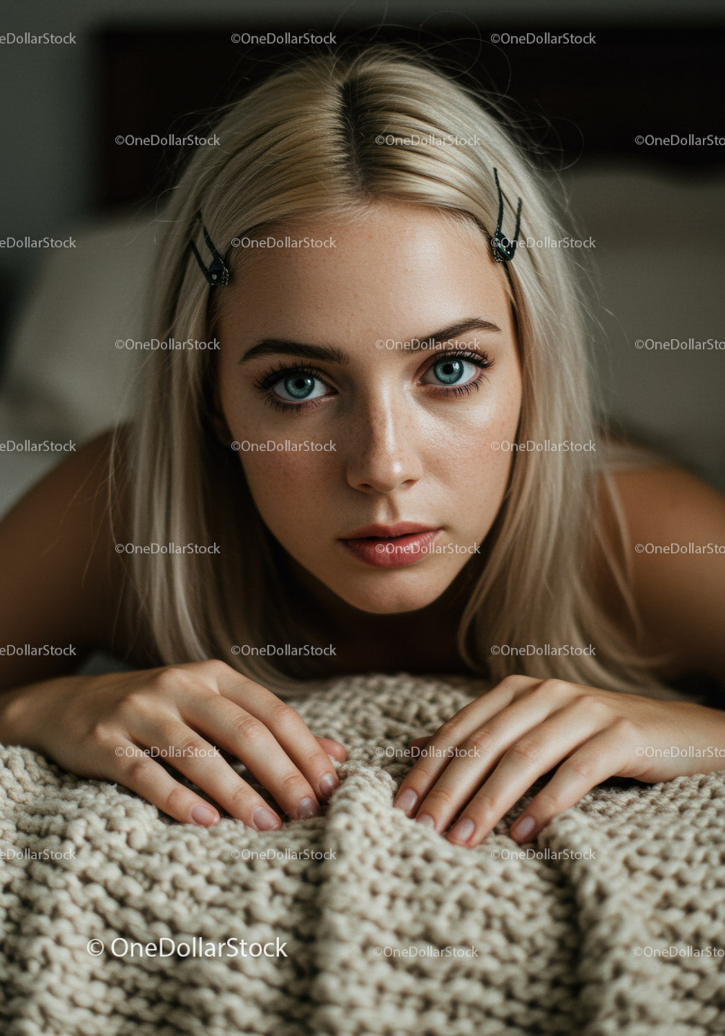 Young Woman with Blonde Hair and Blue Eyes in Cozy Indoor Setting