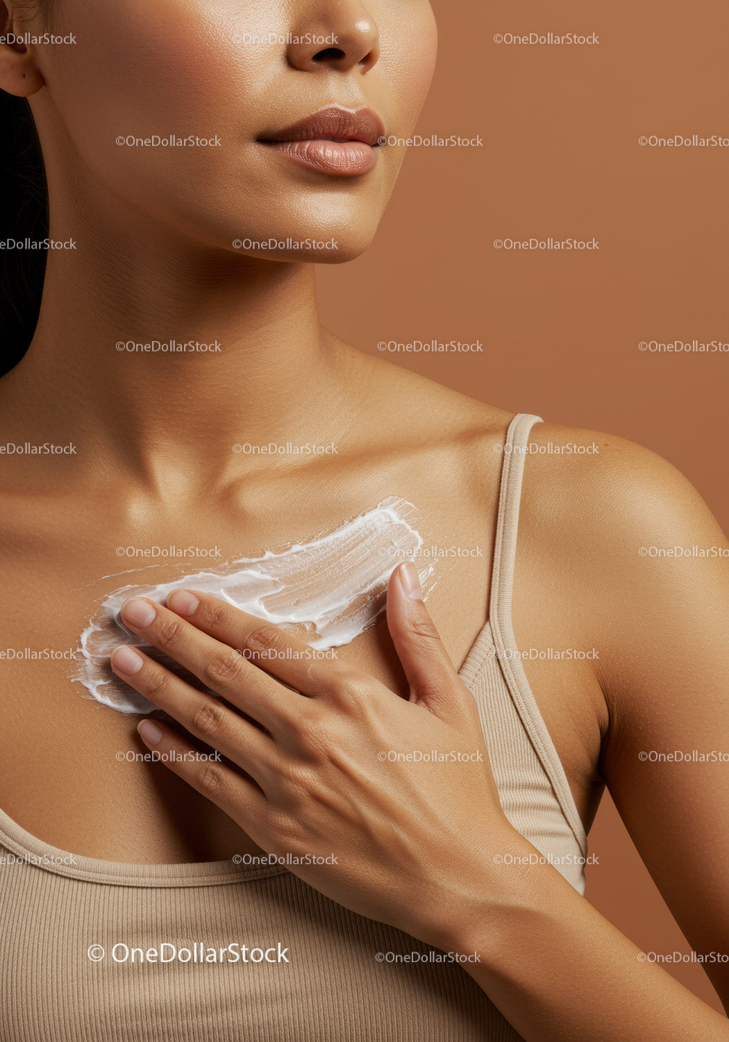 Close-up of Woman Applying Cream to Chest Showing Smooth Skin