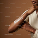 Close-up of Hand with Lotion on Arm Highlighting Skin Hydration and Care