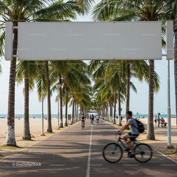 Palm tree lined beach pathway with cyclists JPG Mockup Image