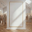 Elegant Clothing Display with Large Gold Framed Poster