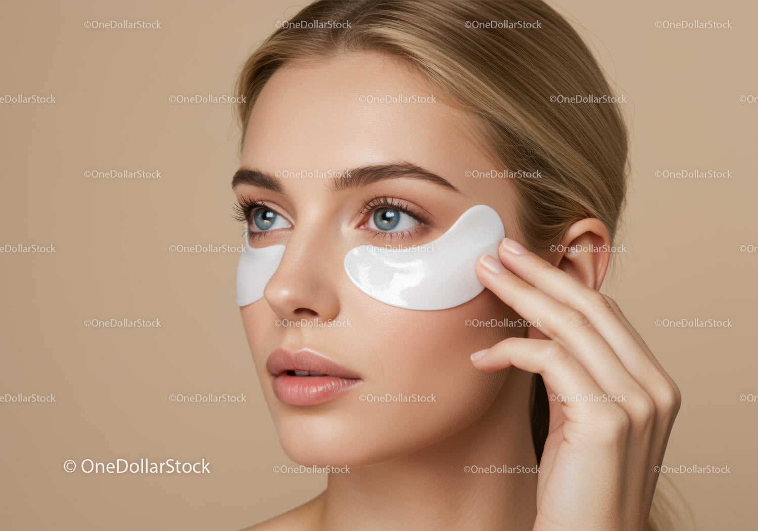 Beautiful Woman Applying Eye Patches for Skincare and Beauty