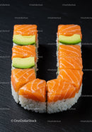 Fresh salmon and avocado sushi arranged in U shape