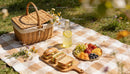 Summer picnic with fresh sandwiches and fruit platter