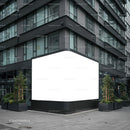 Modern building corner with large blank advertising panel