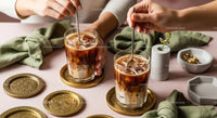 Refreshing Iced Coffee in Elegant Glasses on Modern Pink Table
