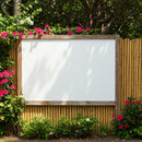 Blank wooden frame surrounded by vibrant garden flowers