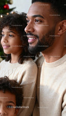 Happy Family Enjoying Cozy Holiday Moments Indoors