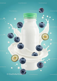 Fresh blueberry yogurt bottle with splashing milk