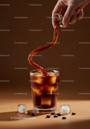 Pouring Iced Coffee Amid Coffee Beans and Ice Cubes