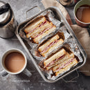 Ham and Cheese Club Sandwich on Aluminum Foil with Coffee and Tea