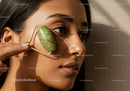 Young Woman Using Jade Roller for Facial Massage and Skin Care