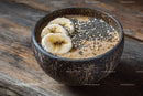 Nutritious Banana Chia Smoothie Bowl in Rustic Coconut Bowl