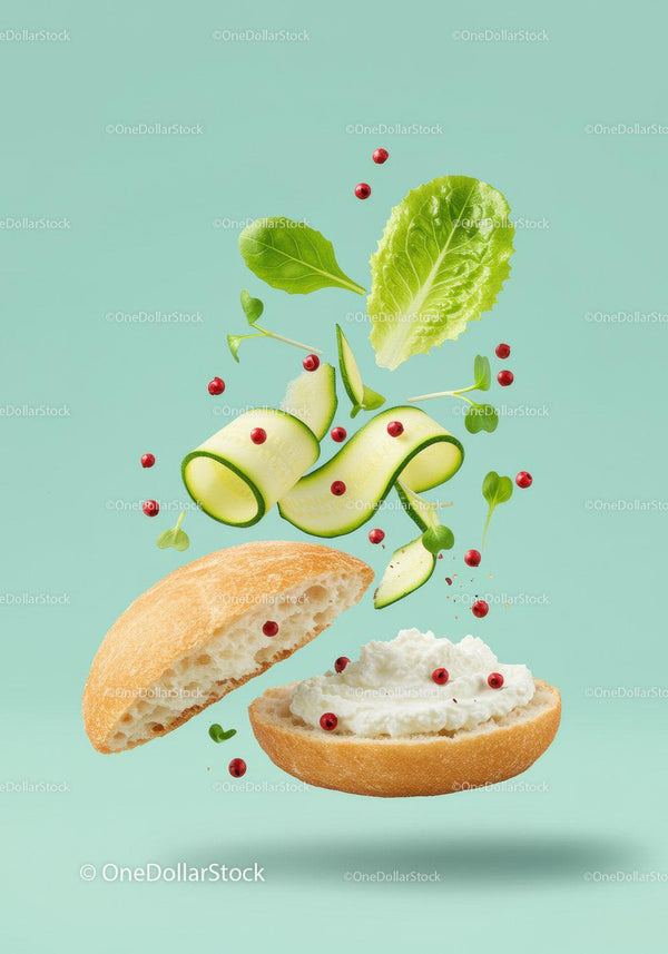 Fresh sandwich ingredients floating on pastel background