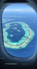 Aerial View of Overwater Islands in Clear Blue Ocean