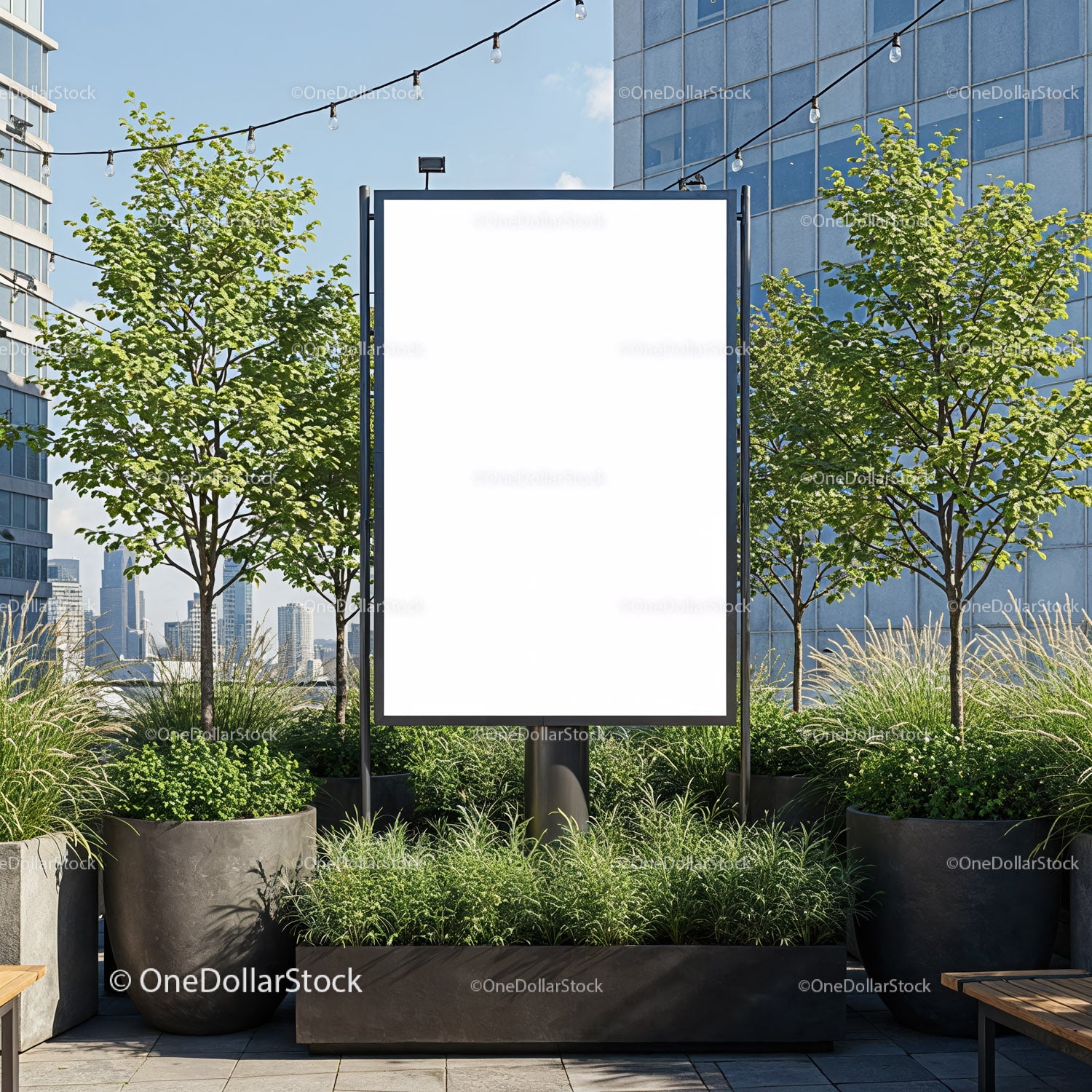 Urban outdoor billboard surrounded by green plants