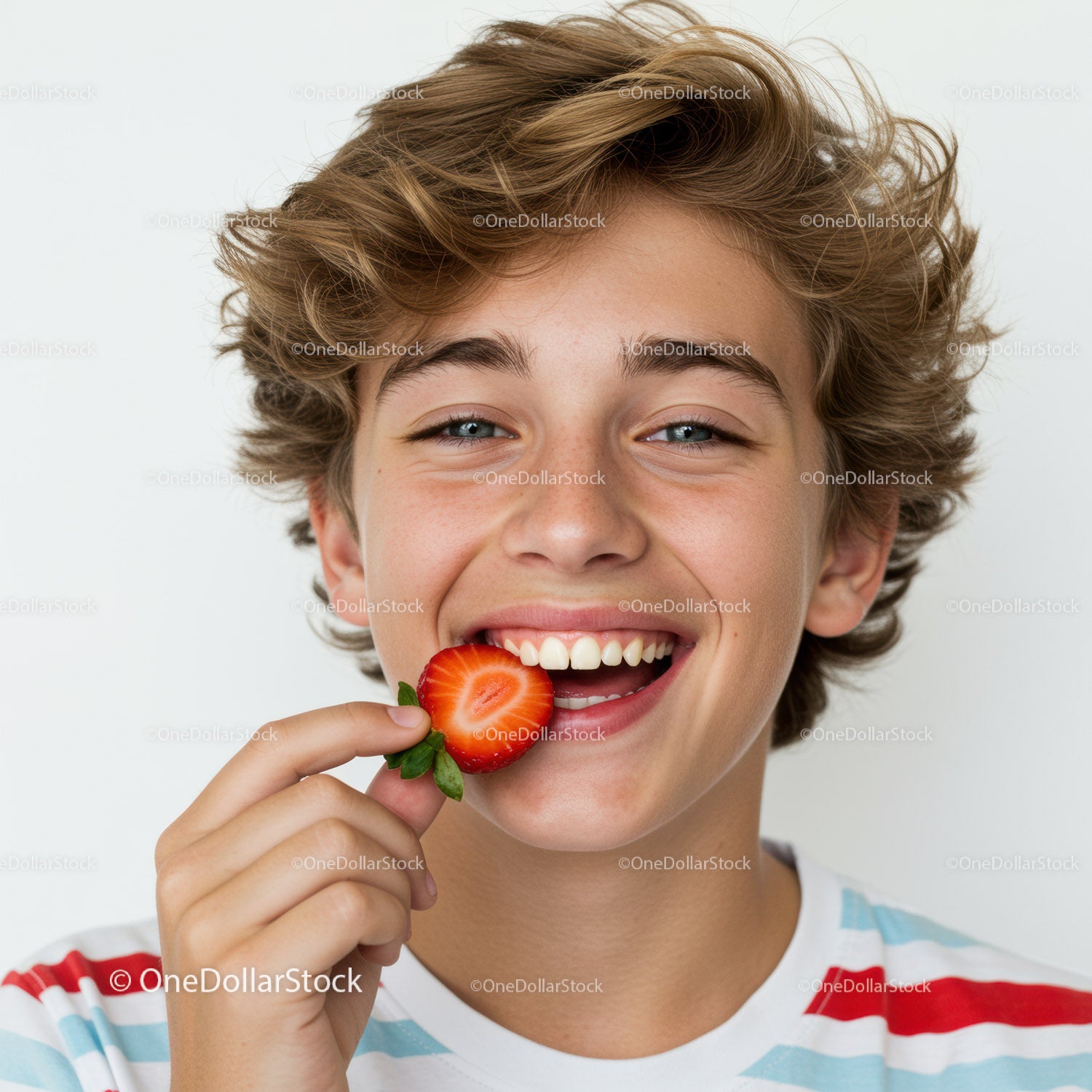 Young Boy Enjoying Fresh Strawberry with Happy Smile