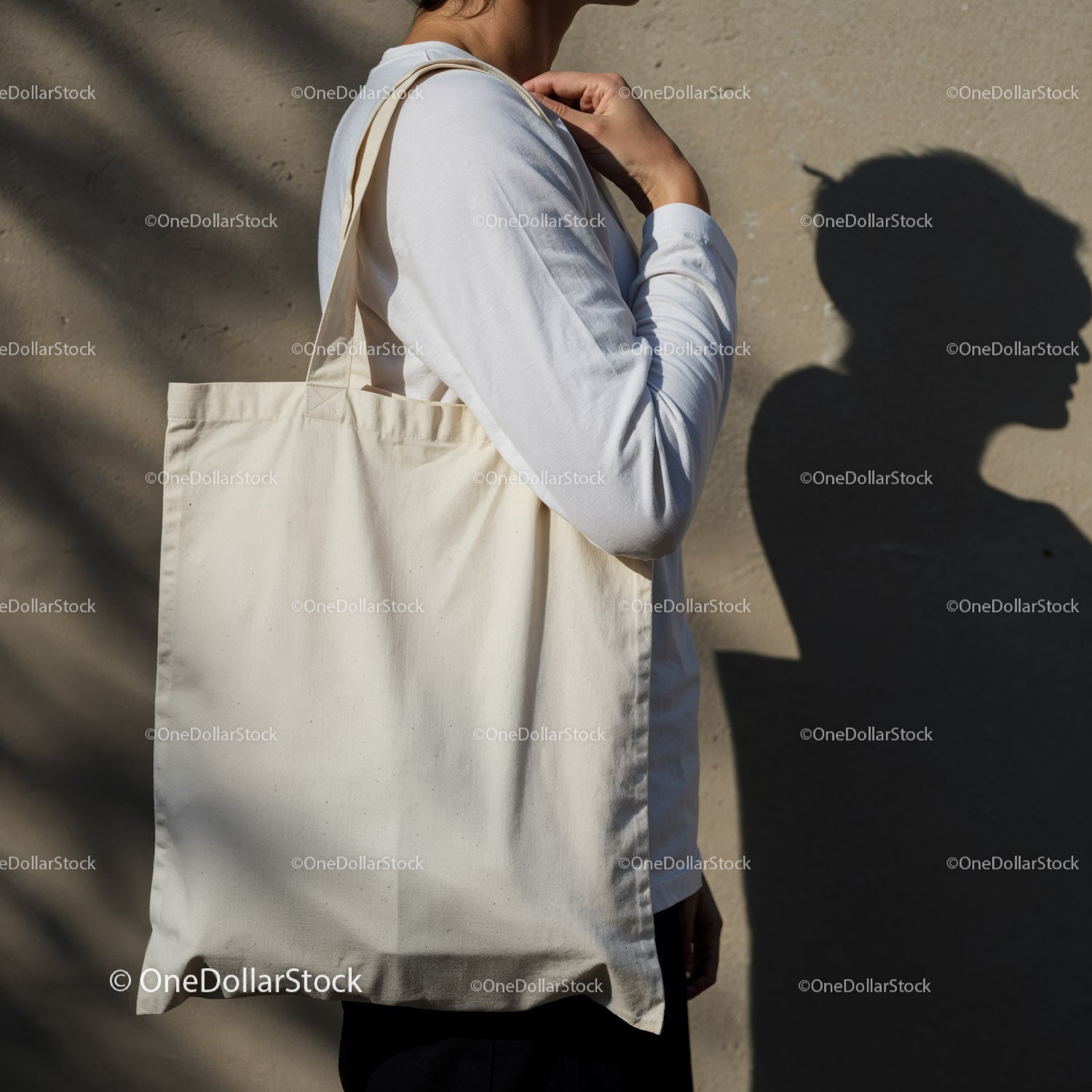 Person Carrying Plain Cotton Tote Bag Against Wall