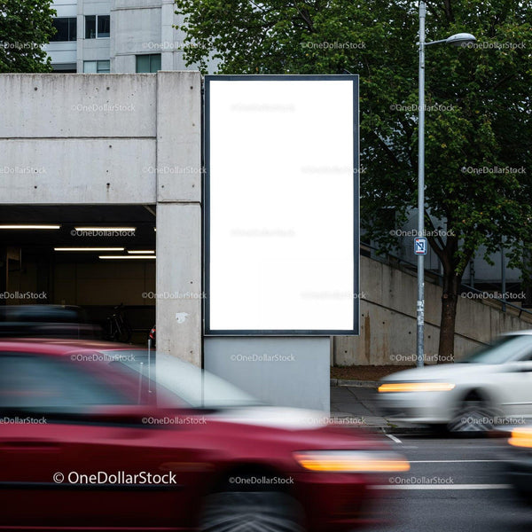 Blank vertical billboard on urban street with traffic JPG Mockup Image