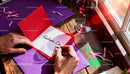 Writing a Romantic Love Note with Wine in Warm Sunlight