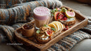 Fresh Fruit Baguette with Honey Jam and Pink Drink on Wooden Tray