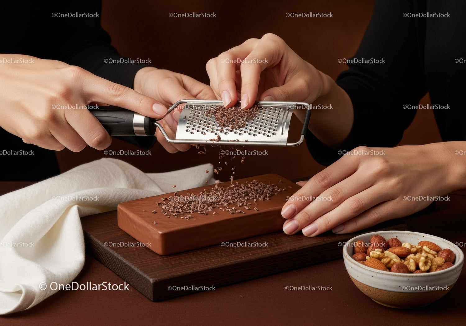 Hands Grating Chocolate with Nuts on Wooden Board for Gourmet Dessert