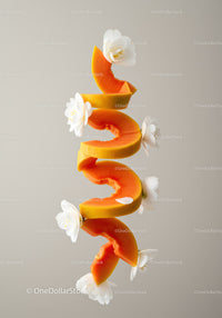 Floating papaya slices with delicate white flowers