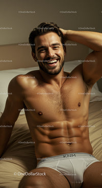 Smiling young man relaxing on bed in white underwear