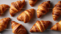 Fresh Croissants with Flaky Layers in Bakery Setting